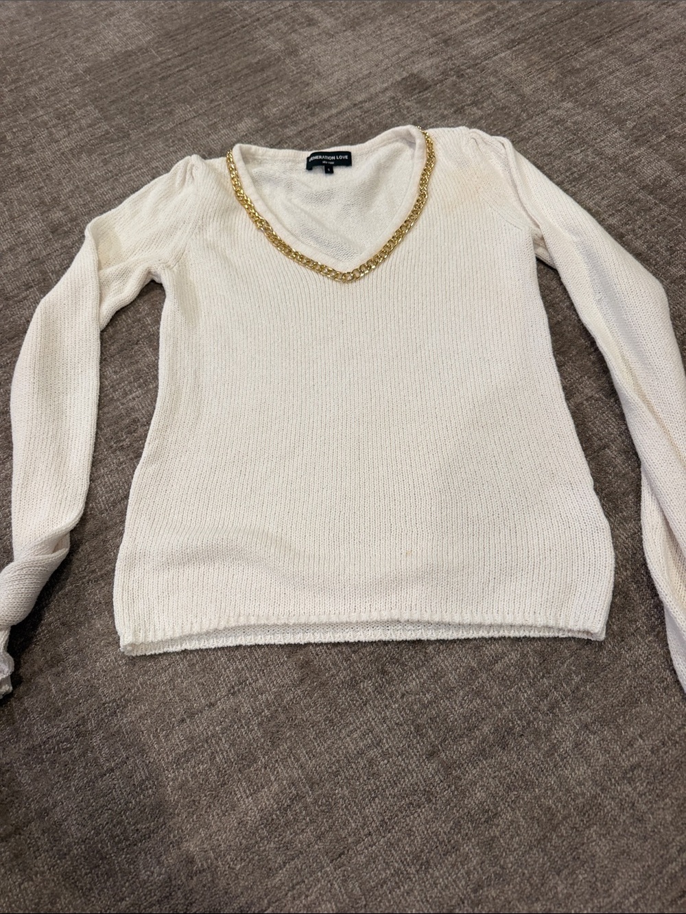 Generation Love Cream V‑Neck Sweater with Gold Chain Trim